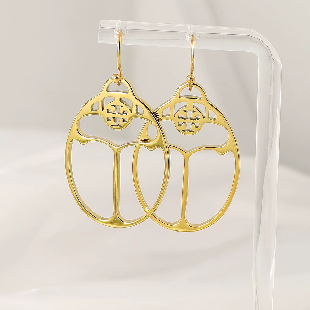 Tory Burch TANG LISHUANG Hollow Oval Metal Earrings